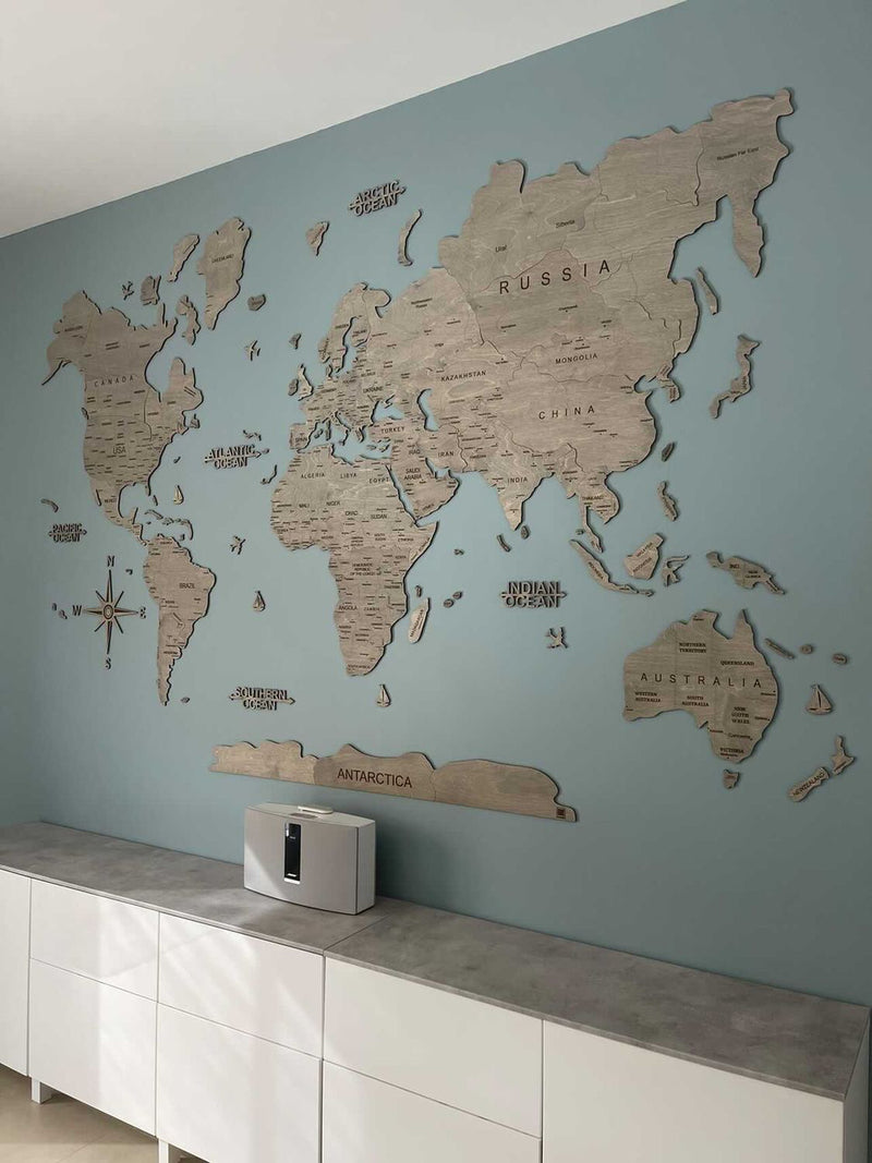 A GeoArte wooden world map in a customer's home