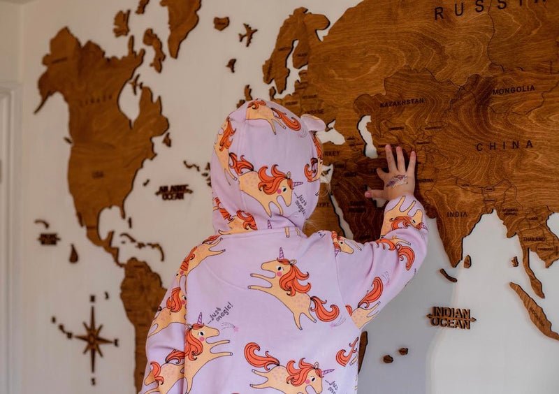 A GeoArte wooden world map in a customer's home